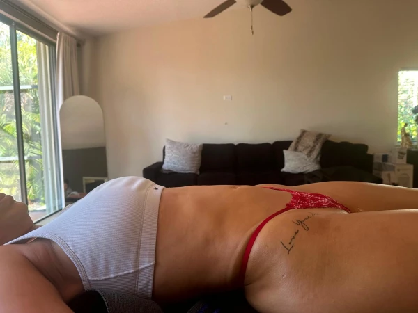 Side view of a client’s abdomen and waist while lying on the treatment table